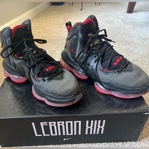 Used condition mens size 7 Nike Lebron 19 Mids basketball shoes.